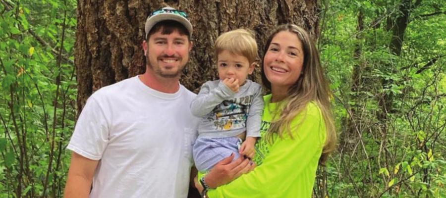 MHS tennis coach Catherine Sedlacek was named the Class AAAA Region 3 Coach of the Year by the Texas Tennis Coaches Association. Sedlacek is pictured here with her husband, Stuart, and their son, Clint. COURTESY PHOTO