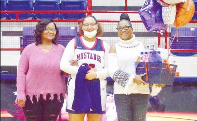 MHS honored Ciarria Davis, the lone senior on the Lady Mustangs, after the team’s victory over China Spring at MHS Monday. CAMPBELL ATKINS